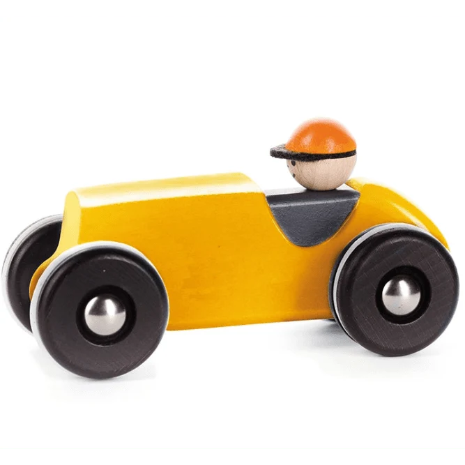 Yellow toy car with a driver figure on a white background
