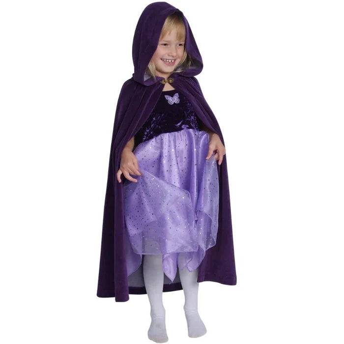 Child wearing a purple dress with a hood on a white background