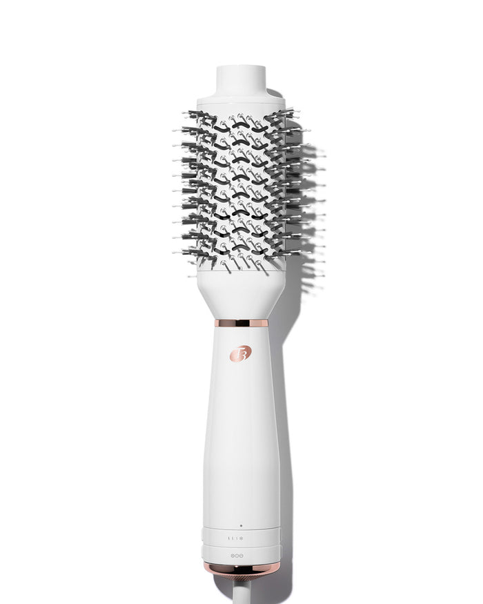 White hairbrush with bristle head on a white background