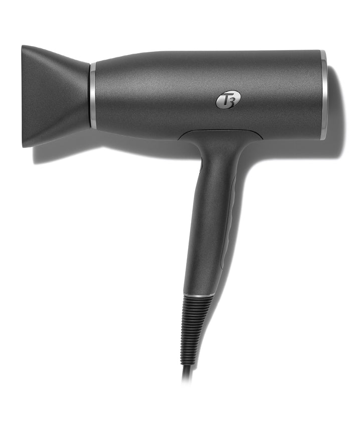 Black hair dryer on a white background