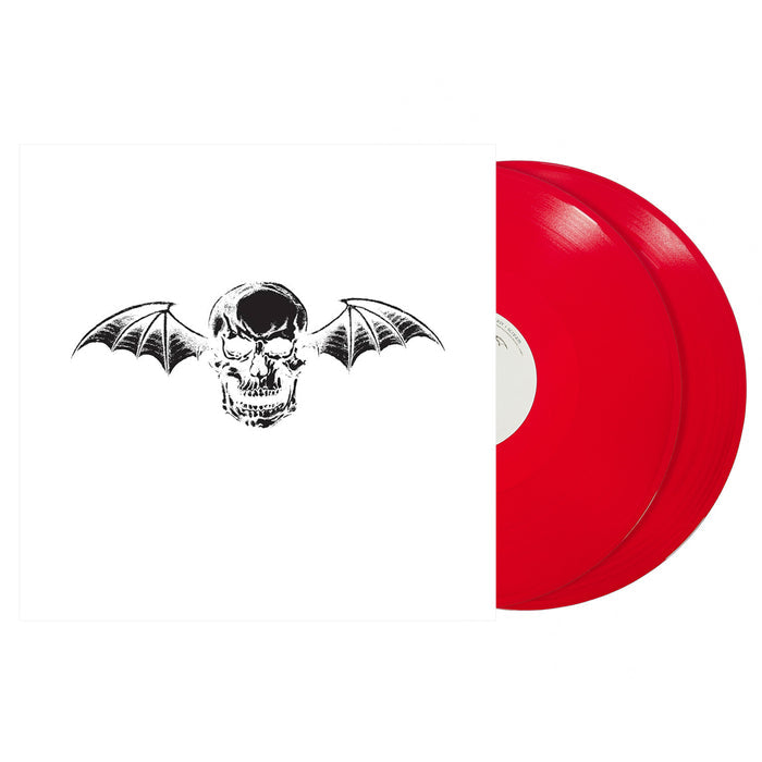 Two red vinyl records (2xLP) partially slide out of a self-titled white Avenged Sevenfold album cover with a black skull and bat wings illustration centered on the front.