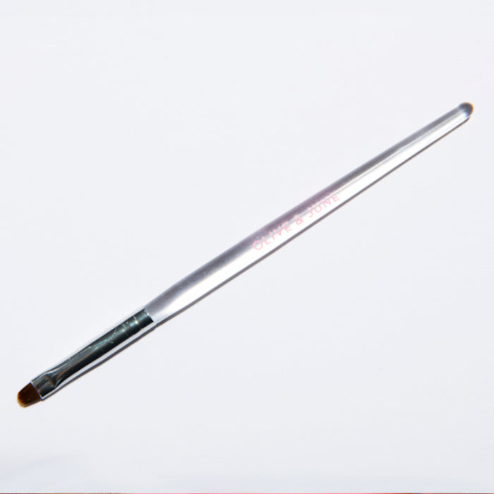 Clean Up Brush angled tip designed for precise polish clean up and creating sharp manicure edges at home