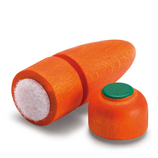 Wooden carrot with velcro slices on a white background