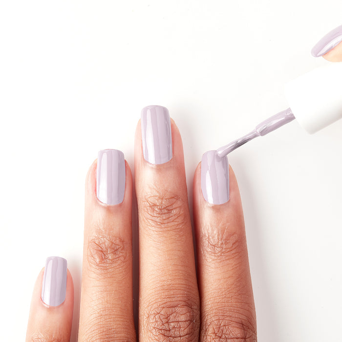 Applying Lilac Luster pastel purple nail polish
