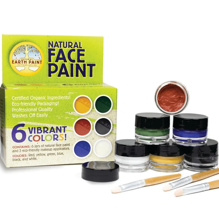 Natural face paint kit with jars of paint and brushes on a white background