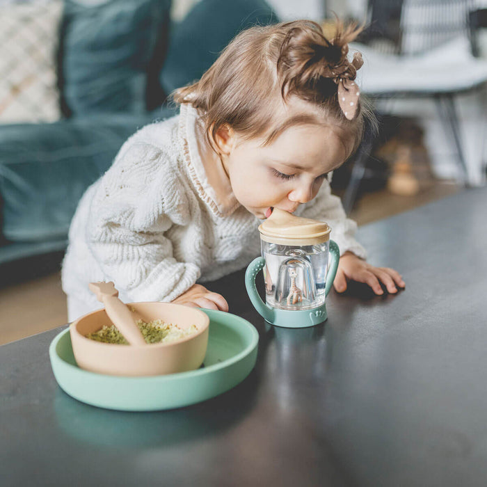 Child using sippy cup