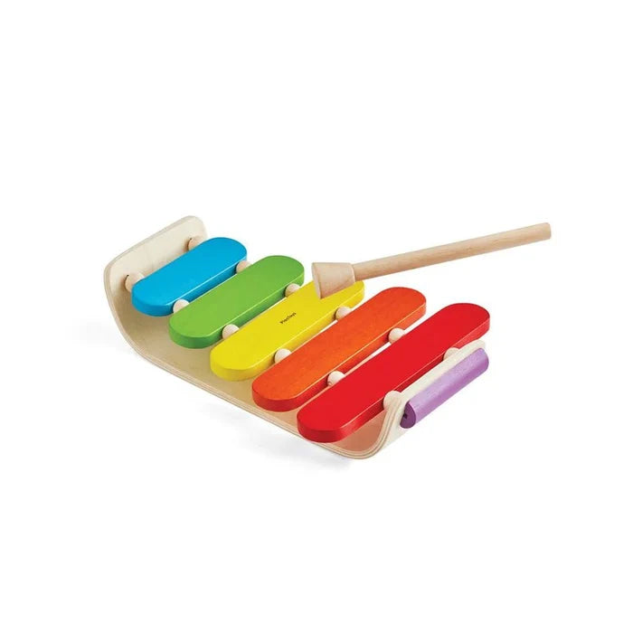 Colorful wooden xylophone toy on a white background