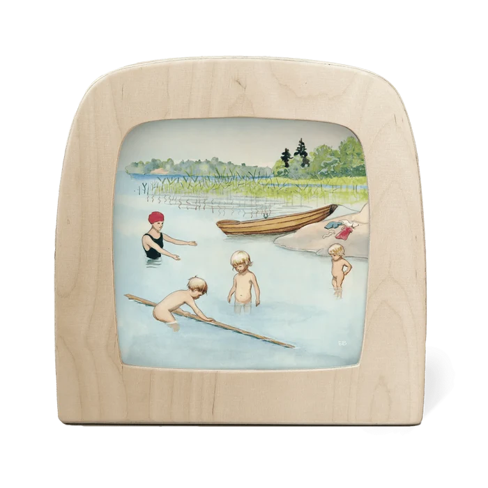 Wooden picture frame with a of children playing in a lake