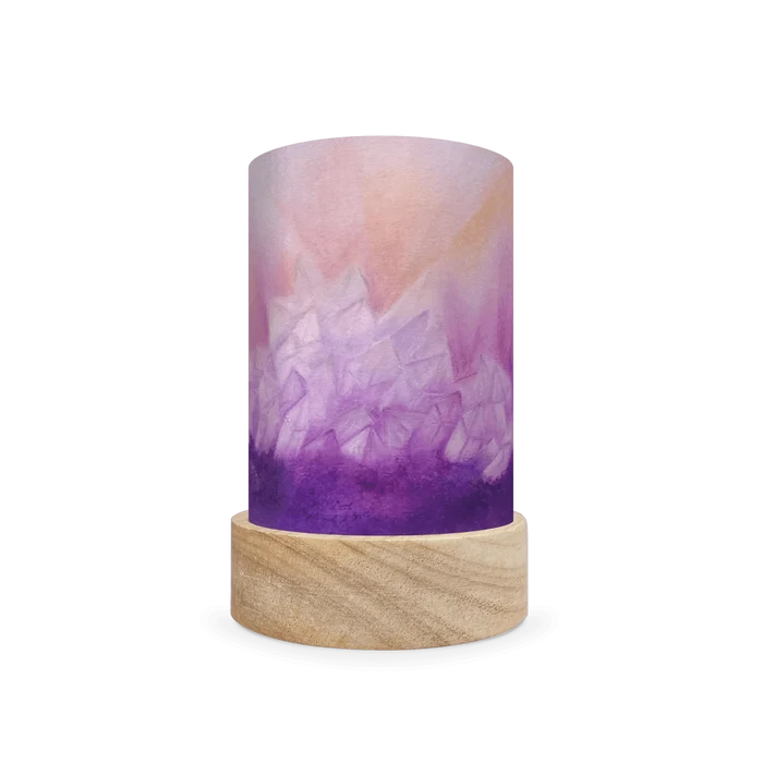 Decorative cylindrical lamp featuring a scene of purple amethyst on a white background