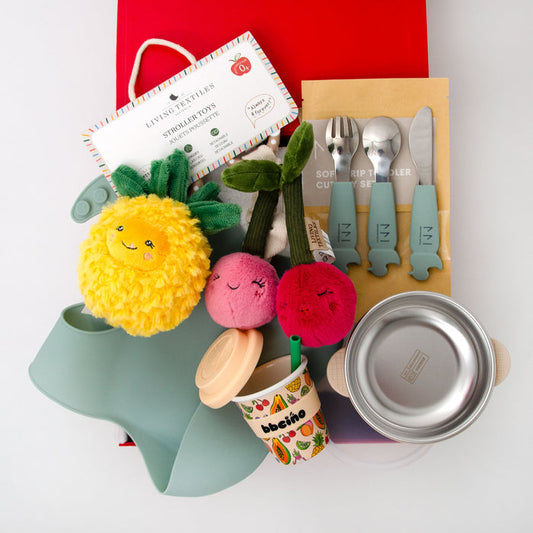 Collection of children's items including a plush toy, cutlery set, bowl, bib and cup in a red gift box. $135.00