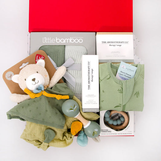 Includes an olive Bamboo Cellular Blanket Set containing two super soft, lightweight blankets. An ergoPouch romper, a Speedy Monkey Wooden Maraca, Jellystone Moon Teething Ring and cute Fehn muslin comfort toy. For mum, a Coconut &amp; Waterflower scented candle and matching hand cream. Price: $230