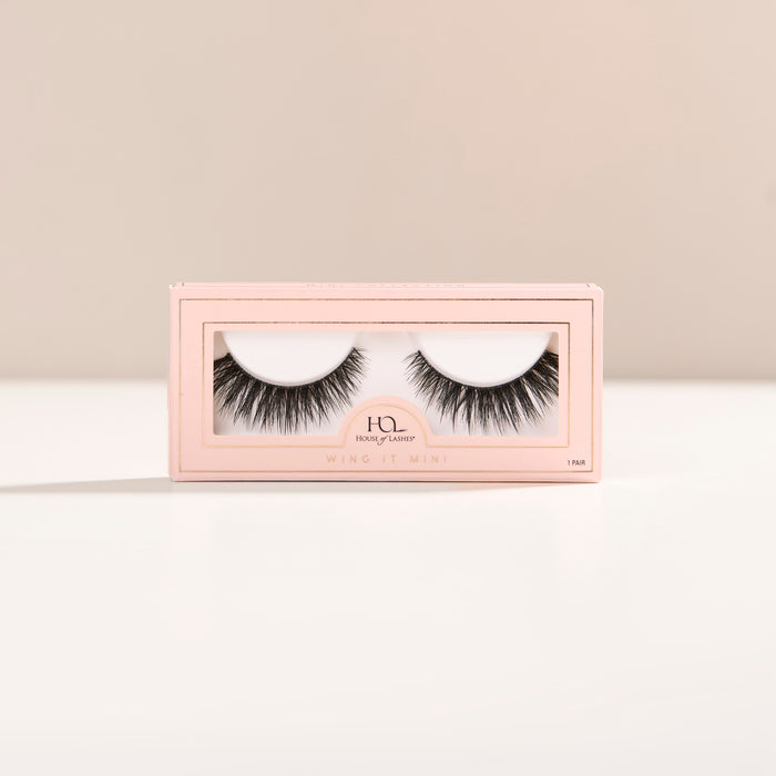 A mini flared lash with full volume and short length, featuring a dense base, tapered ends, and a subtle cat-eye flare.