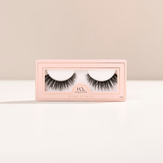 A mini flared lash with full volume and short length, featuring a dense base, tapered ends, and a subtle cat-eye flare.